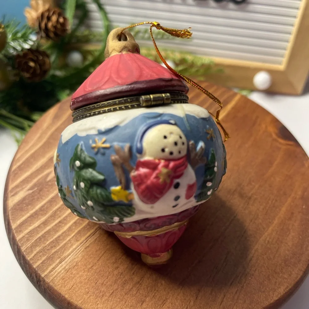 Festive Snowman Ornament with Red and Blue Accents